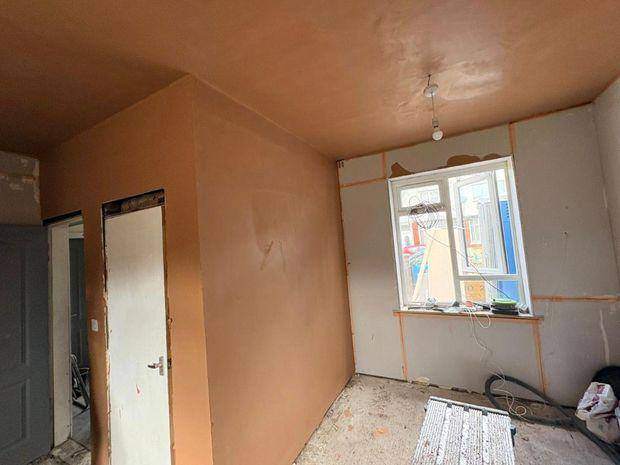 Room freshly plastered to walls and ceiling during a void refurbishment