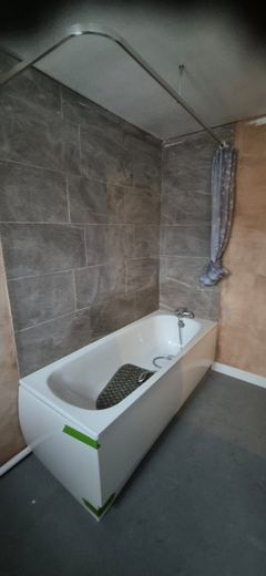 New bath protected while the room is finished around it