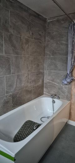 New bath tiled in and sealed