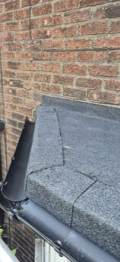 Bay window roof re-covered and dressed to the wall