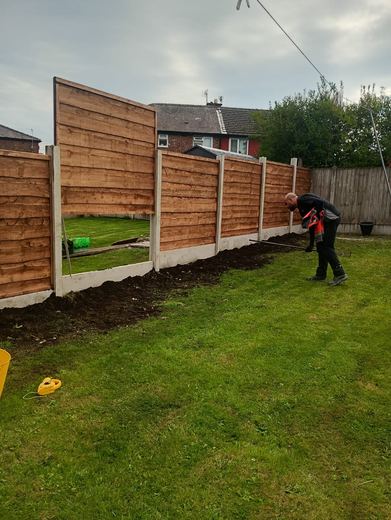 New close-board fence run along a rear boundary