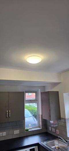 Completed kitchen with units, worktop and appliances in