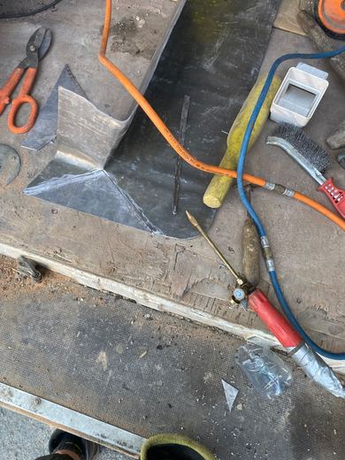 Lead, tools and torch set out during leadwork