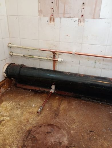 Copper and soil pipework run in before the bathroom is closed up