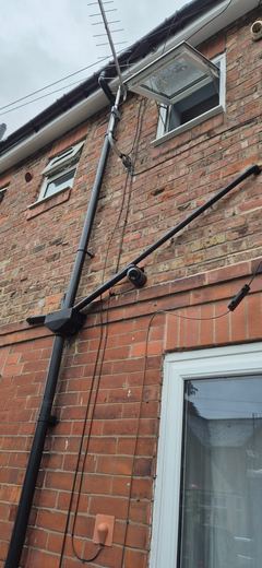 Renewed rainwater goods and stack on a rear elevation