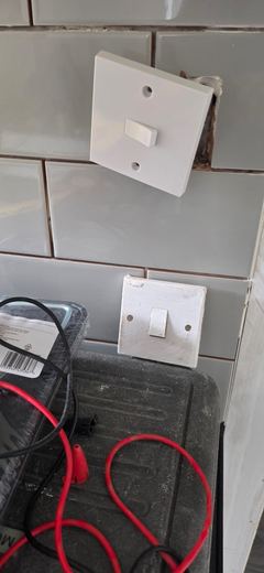 Socket front removed and tested before the plate goes back on