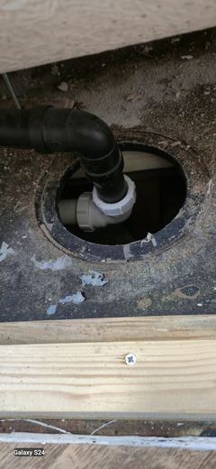 Soil pipe connection made below floor level