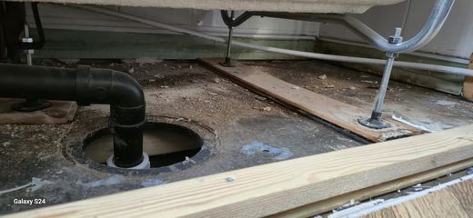 New soil pipework run under a lifted floor