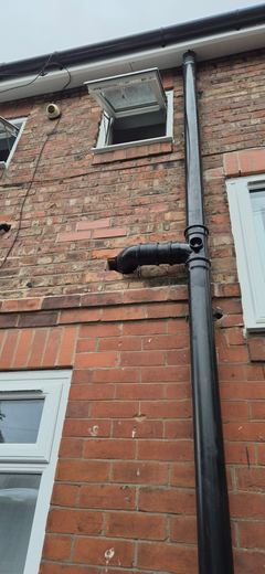 Soil stack and rainwater goods on a rear elevation