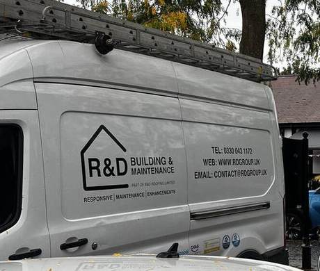 Side of an R&D Building and Maintenance van showing the company contact details