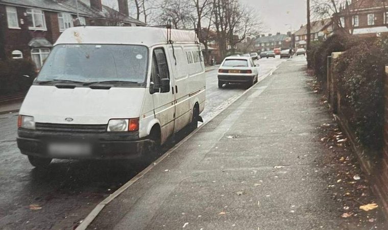 An early Ford Transit van parked on a Manchester residential street in the company's earlier years